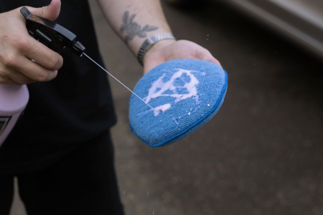Wheel cleaning with a microfiber applicator